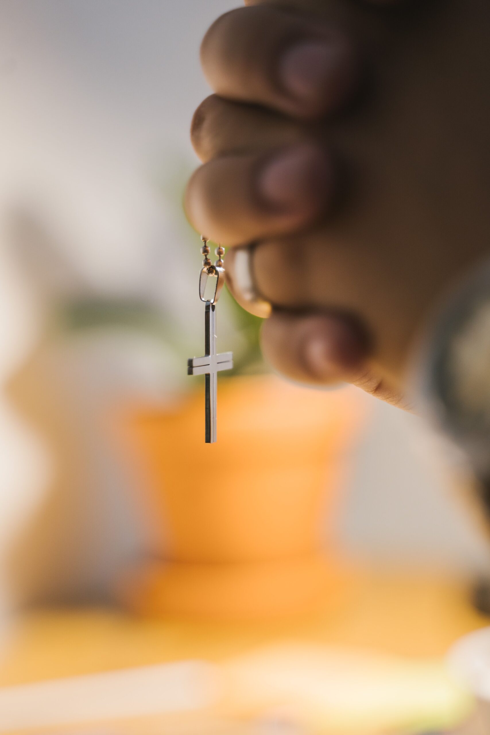 Detailed close up of gold Christian jewelry